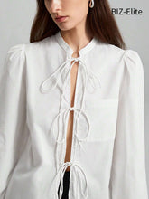 BIZwear Women's Solid Color Lantern Sleeve Lace-up Shirt